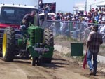 A John Deere model A pulling in the antique tractor pull