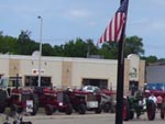 A line-up of Farmall tractors