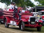 Vintage fire trucks in the Le Sueur Pioneer Power parade