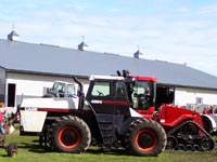 Vintage Case 4994 sits next to a new Quad Trac