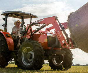 Massey Ferguson 4700 series tractor with front-end loader.