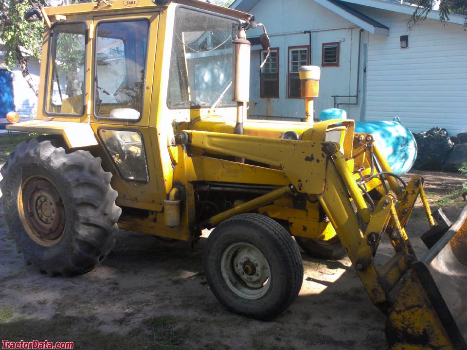 Massey Ferguson 31 industrial tractor with model 34 loader and SIMS after-market cab.