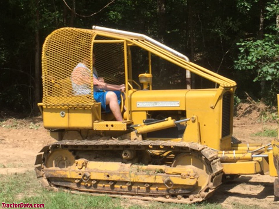 John Deere 350 with 6305 bulldozer and forestry enclosure.