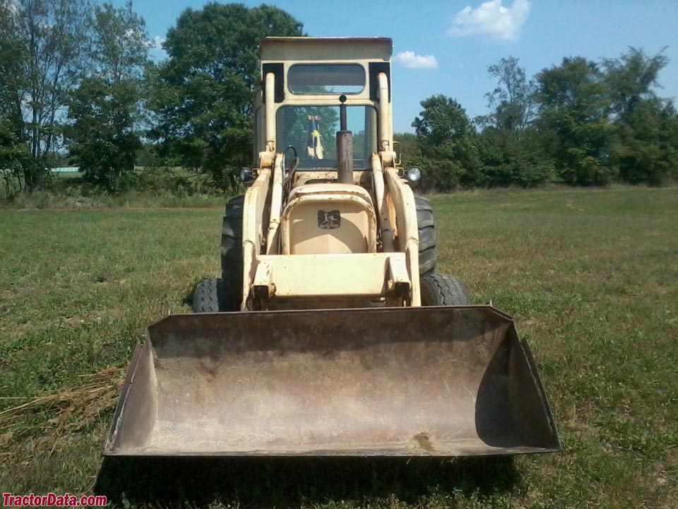 John Deere 401C backhoe-loader tractor with cab.