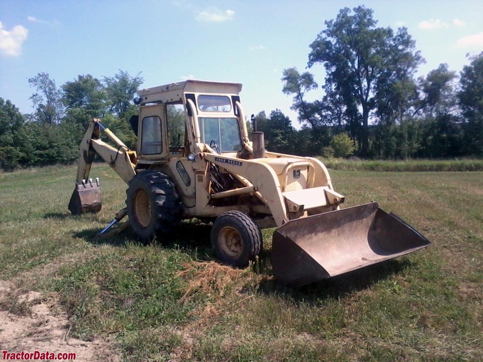 John Deere 401C backhoe-loader tractor with cab.