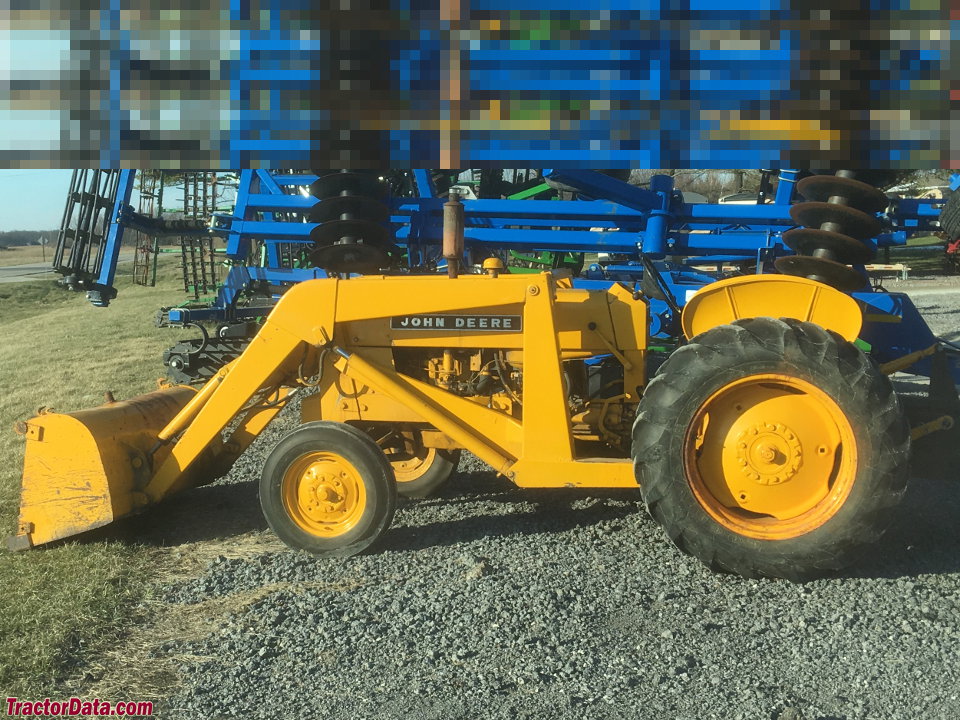 John Deere 440 with loader.