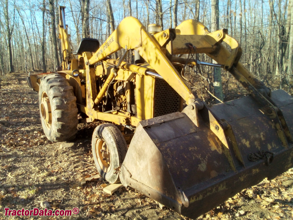 John Deere 3010 Wheel with loader and backhoe, front-right view.