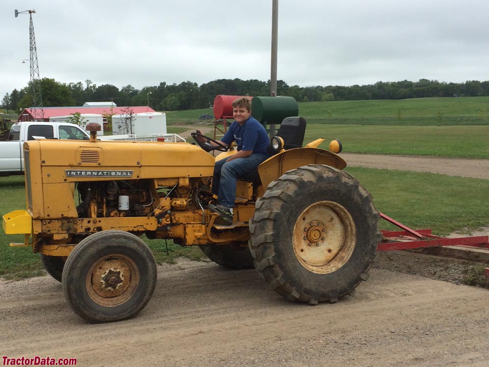 Lyman maintaining roads at Pioneer Days on an International 2544.