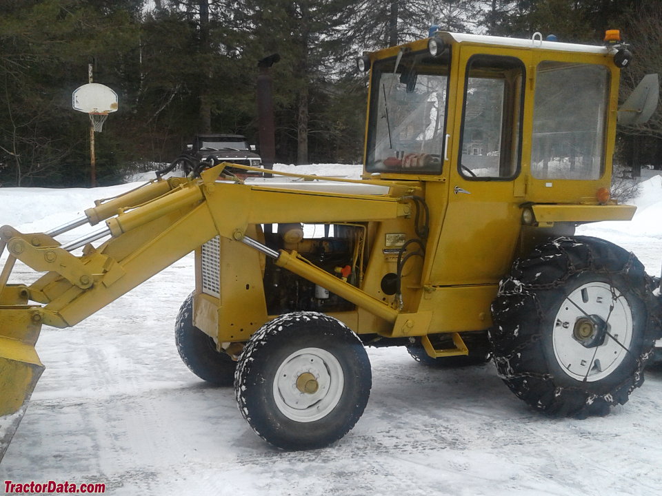 International 3514 with cab and loader.