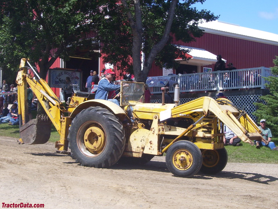 Massey Ferguson Work Bull 404 with loader and backhoe.