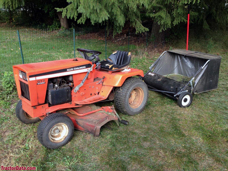 Allis-Chalmer 917 with lawn sweeper.