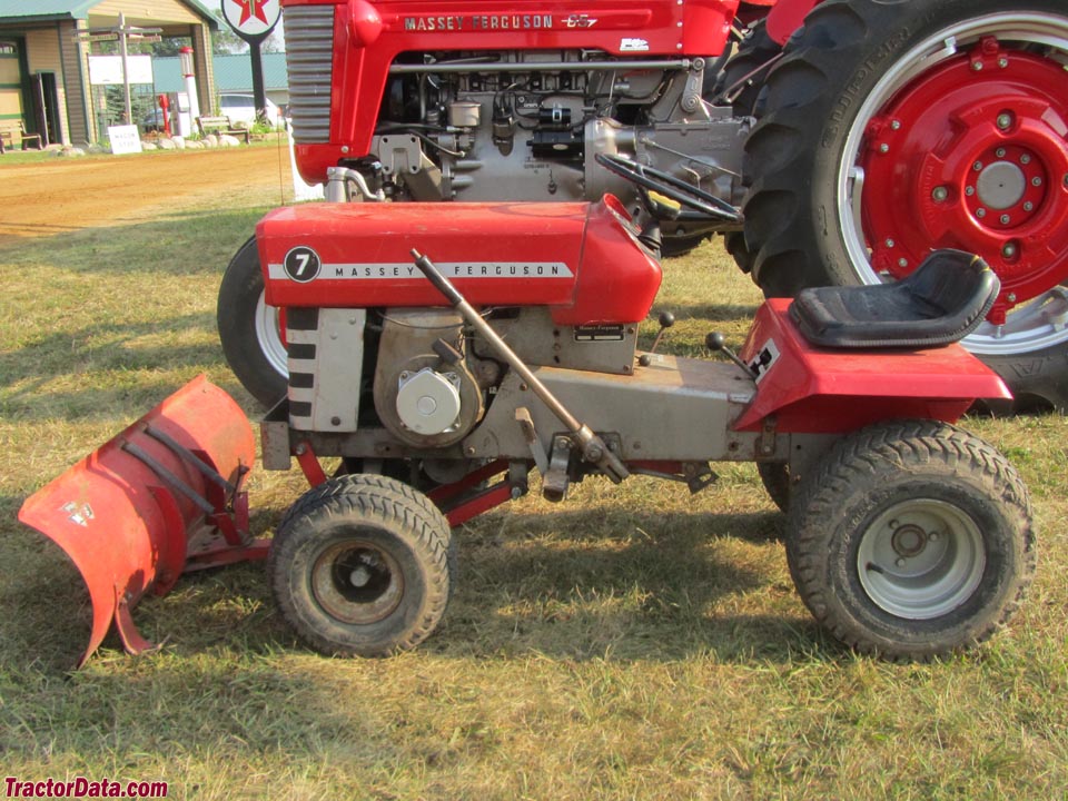 Massey Ferguson 7 with front blade.