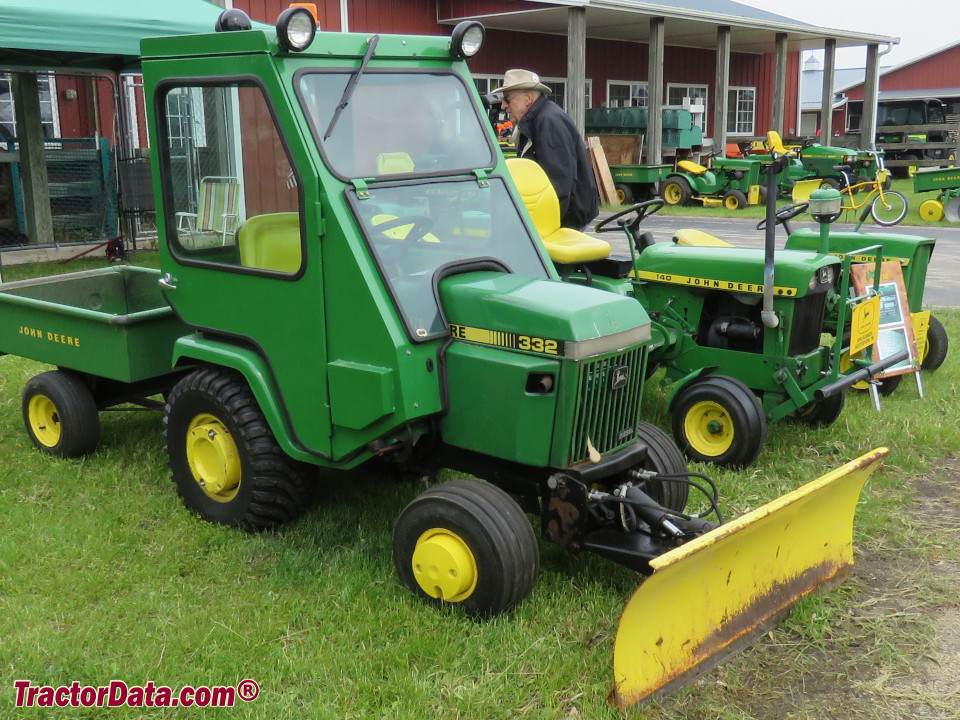 John Deere 332 with cab and 54 hydraulic blade.