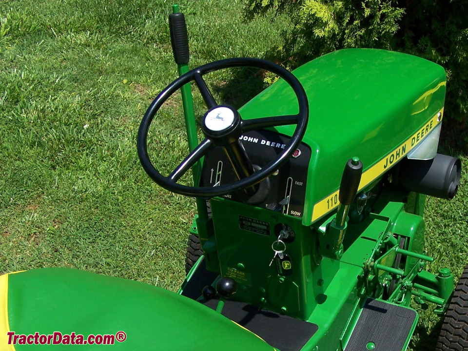 John Deere 110 operator station and controls.