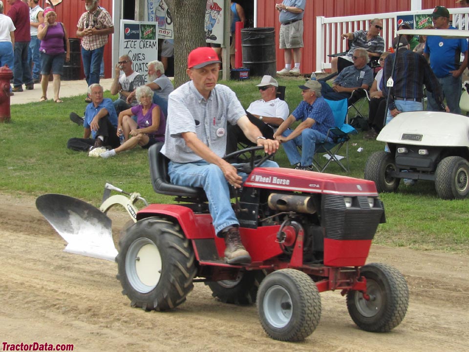 Wheel Horse 417-A with plow.