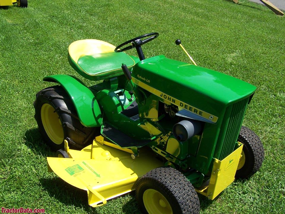 1967 (round-fender) John Deere model 112 with hydraulic lift.