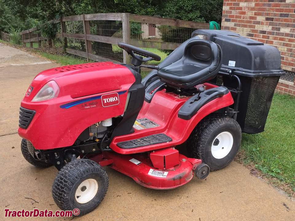 Toro LX460 lawn tractor with deck and bagger.