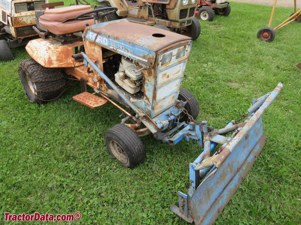 Ford LT-80 lawn tractor with front blade.
