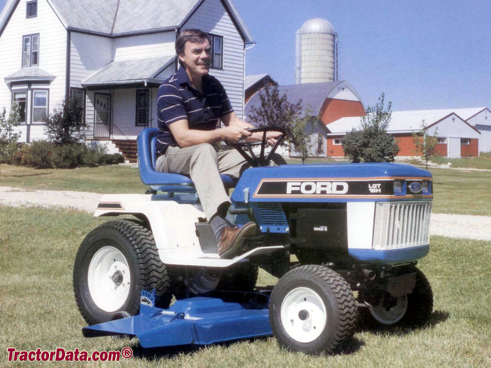 Early-style Ford LGT 18H with mower.