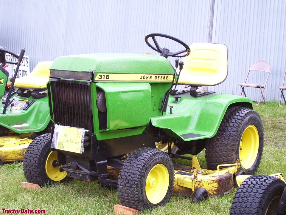 John Deere 316 with mower deck.