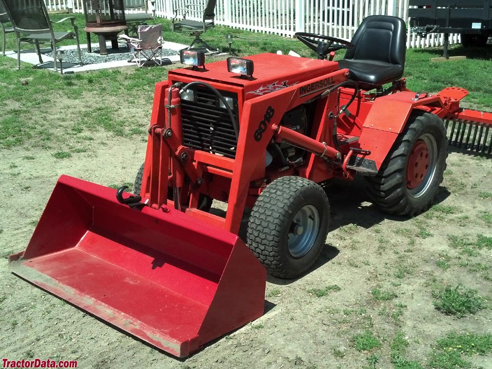 Ingersoll 6018 with front-end loader and landscape rake.