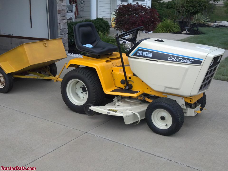 Cub Cadet 1210 with dump cart.