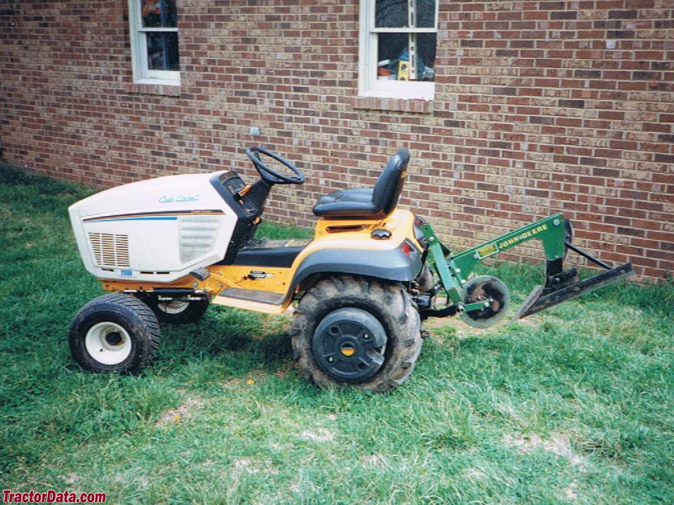 Cub Cadet 2086 with three-point mounted plow.