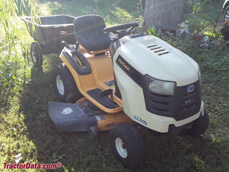 Cub Cadet LTX 1040 lawn tractor with cart.