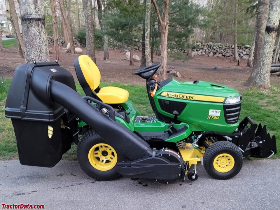John Deere X730 with mower deck and rear bagger, right side.