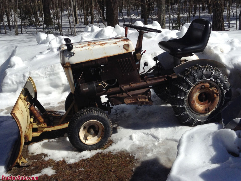 Bolens 900 with a front-mount plow.