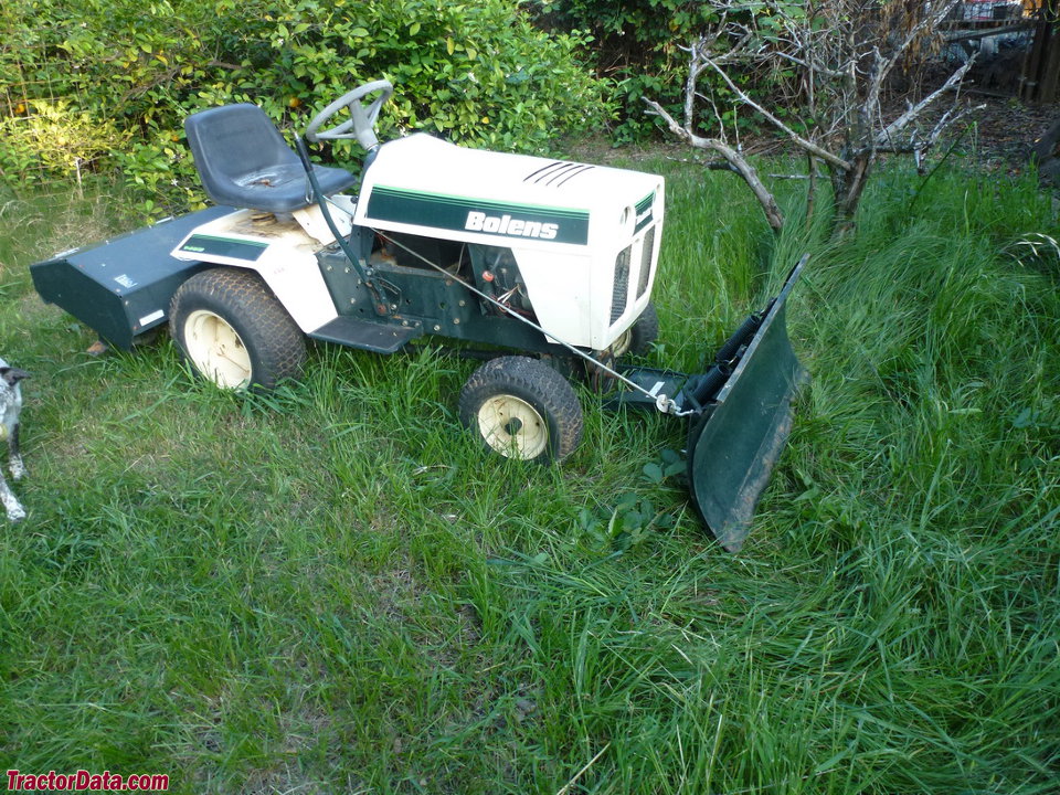 Bolens 1468 with front blade and tiller.