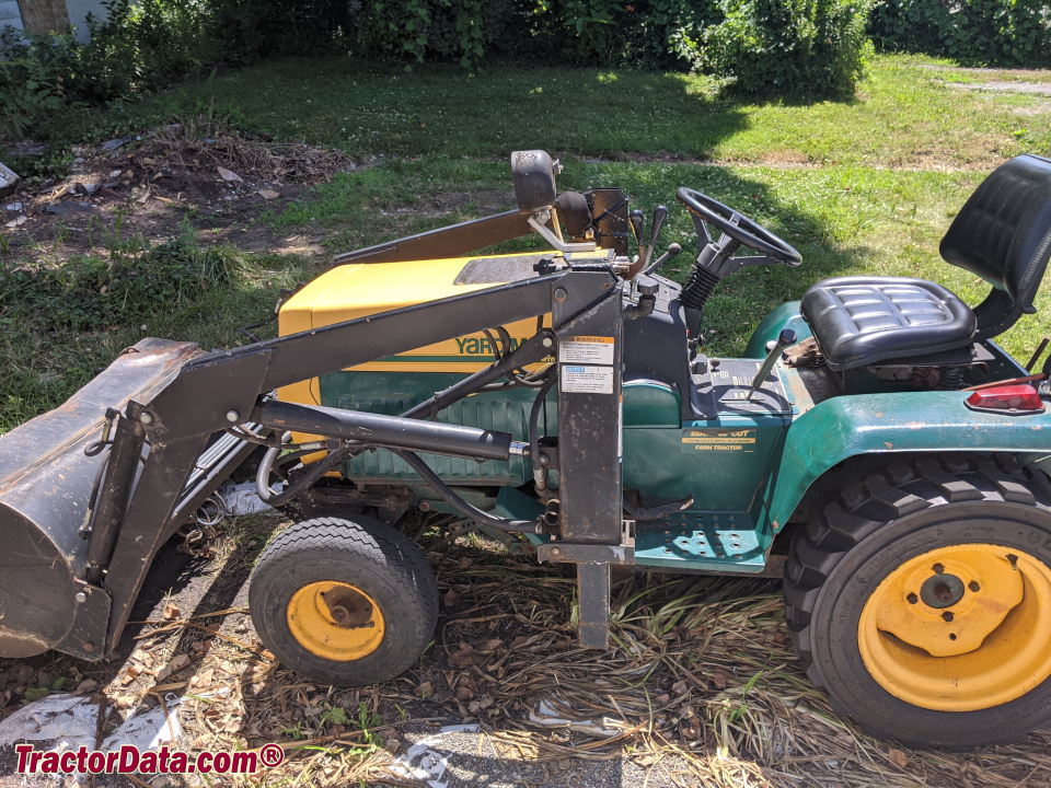 Yard-Man 999 garden tractor with Kwik-Way front-end loader.