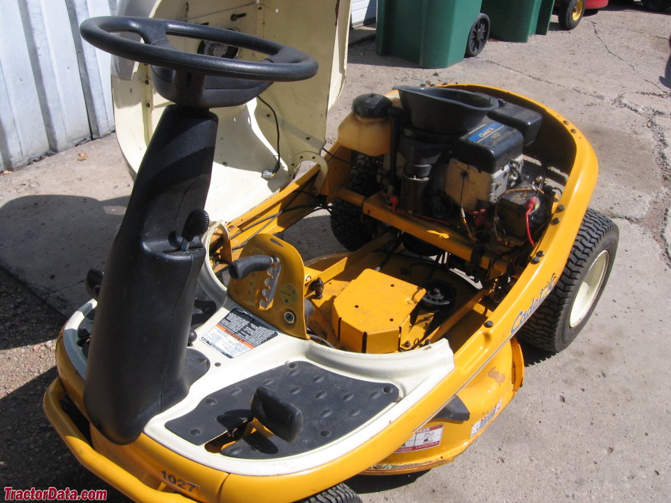 Cub Cadet 1027 with hood raised, showing engine and deck.
