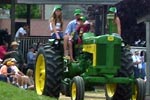 John Deere tractors in parade