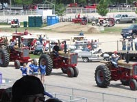 International Gold Demonstrator tractors on parade