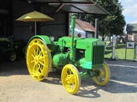 A styled John Deere D on steel wheels