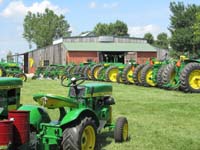 Featured John Deere tractors on exhibit.
