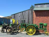 Early John Deere 420, unstyled model A, John Deere GPWT, and a Waterloo Boy