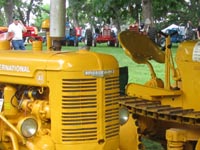 International AI industrial tractor and an Oliver OC6 crawler.