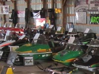 Snowmobiles of all brands in the feature building.