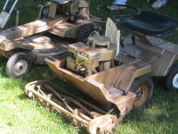 Vintage Mongomery Ward Garden Mark mowers.