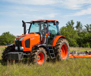 Kubota M6 utility tractor with mower.