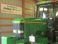 John Deere 7600 in the feature building, this tractor is over 20 years old.