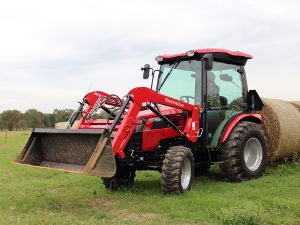 Mahindra 2538 with cab and loader.