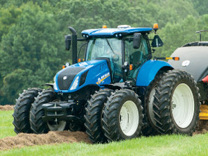 New Holland T7.315 tractor with baler.