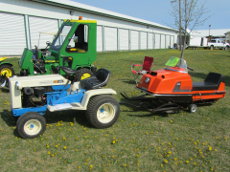 Montgomery Wards 16 garden tractor with Wards 450 snowmobile.