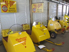 Vintage 1960s-era Ski Doo snowmobiles.