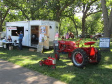 The Credit River club booth and 2016 raffle tractor.