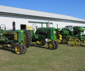 John Deere two-cylinder tractors including a Waterloo Boy.