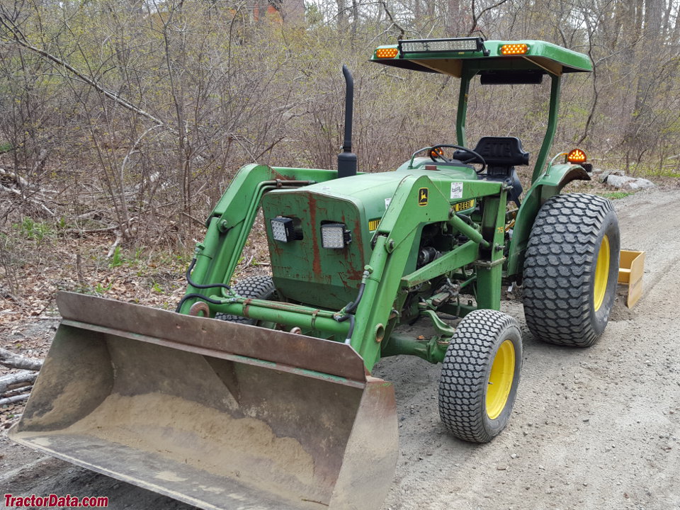 John Deere 1050 tractor with model 75 front-end loader.